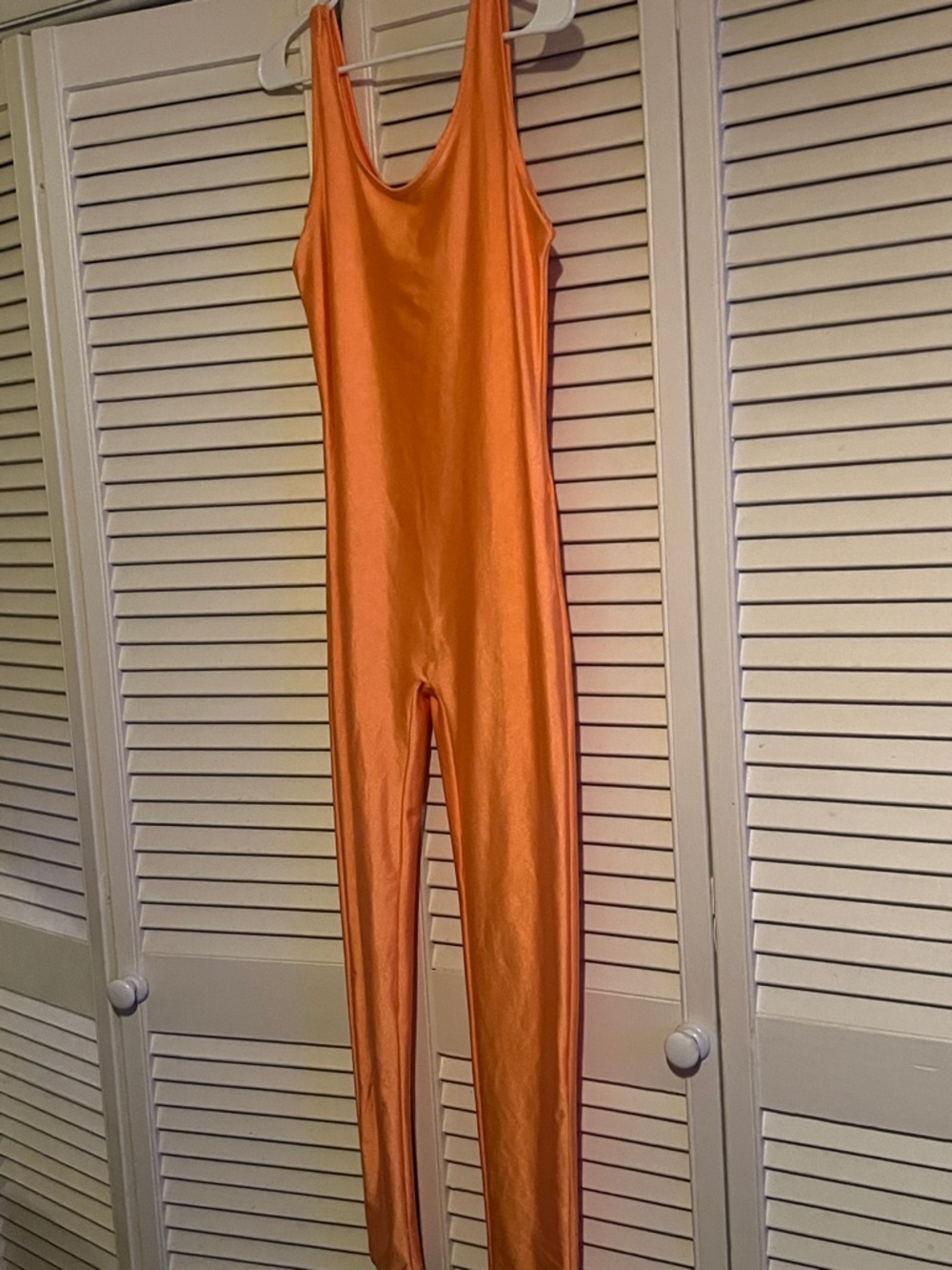 Sleek Orange Metallic Unitard Jumpsuit